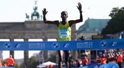 Adola breaks clear to win Berlin Marathon in 2:02:50