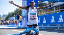 Assefa wins Berlin Marathon in course record 2:11:04